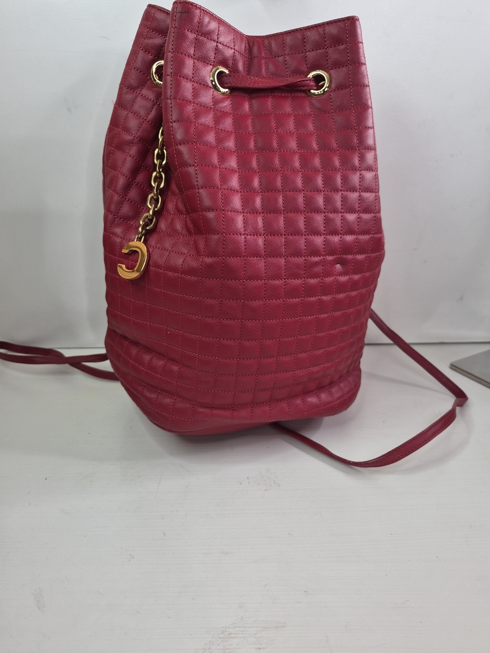 Celine Quilted Drawstring Bucket Bag in Deep Red